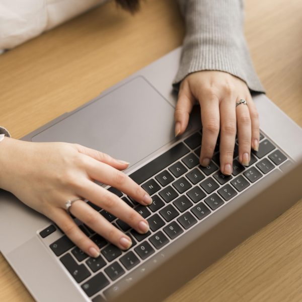 high-angle-woman-wotking-laptop high-angle-woman-wotking-laptop